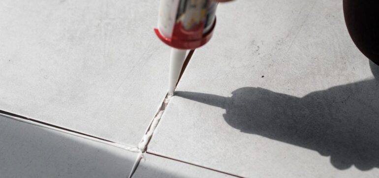Application of joint sealants between concrete or building surfaces to prevent water ingress, ensure flexibility, and maintain structural integrity.